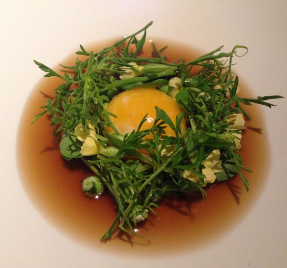 Smoked Egg Yolk, Peas & Soup of Roasted Potato Skin